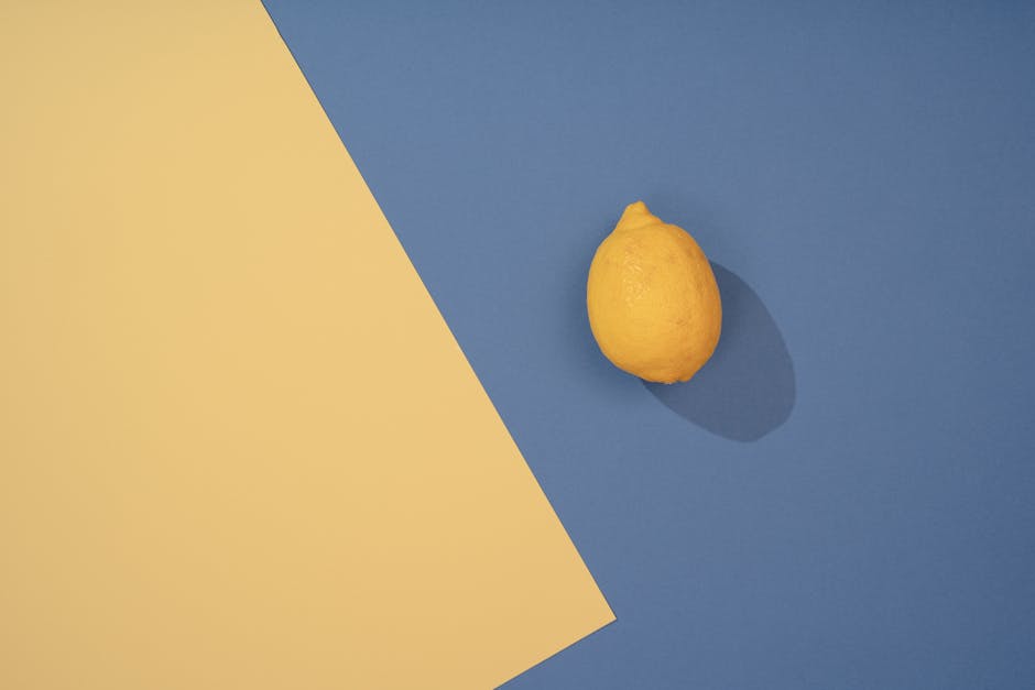 Fresh lemon on blue background